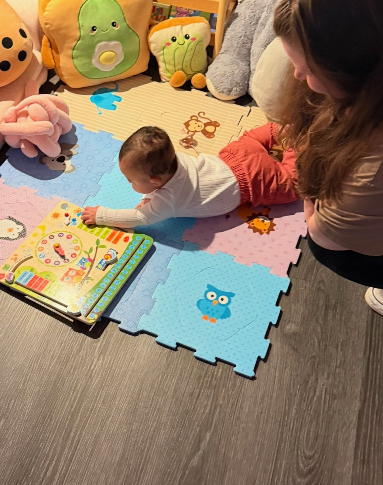 A caregiver with children at Providence Preschool Academy